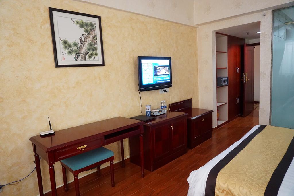 Guangdong Oversea Chinese Hotel Cantão Quarto foto