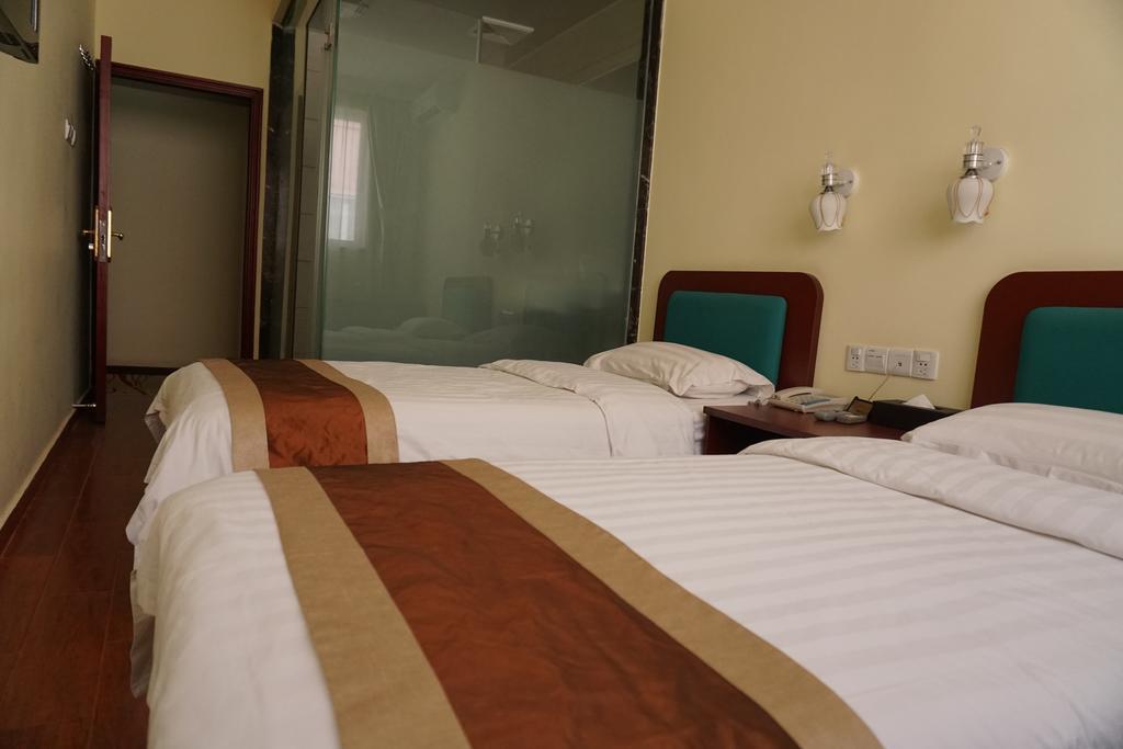 Guangdong Oversea Chinese Hotel Cantão Quarto foto